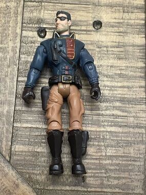 action figure is Ethan "Spade" Crowe from the military toy line The Corps!